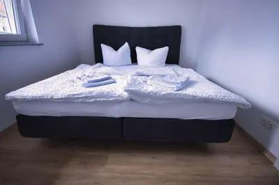 Ein Bett oder Betten in einem Zimmer der Unterkunft Gemütliche Wohnung im schönen Chiemgau