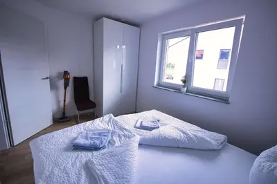 Ein Bett oder Betten in einem Zimmer der Unterkunft Gemütliche Wohnung im schönen Chiemgau