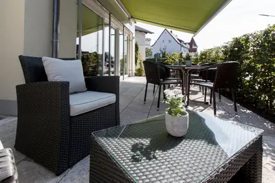 Ein Sitzbereich in der Unterkunft Hotel Bauer garni