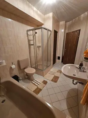 Ein Badezimmer in der Unterkunft Sutra Home - Ottobrunn, Munich