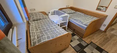 Ein Bett oder Betten in einem Zimmer der Unterkunft Ferienwohnung auf dem Dorf