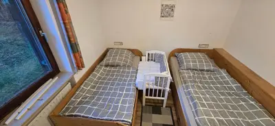 Ein Bett oder Betten in einem Zimmer der Unterkunft Ferienwohnung auf dem Dorf