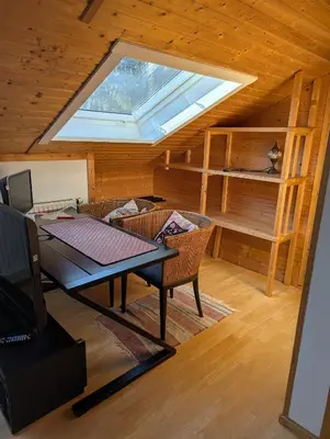 Ein Bett oder Betten in einem Zimmer der Unterkunft Eigene Etage im charmanten Holzhaus