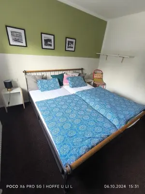 Ein Bett oder Betten in einem Zimmer der Unterkunft Ferienwohnung Rösenau