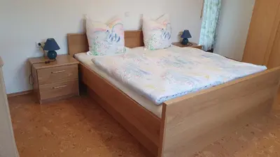 Ein Bett oder Betten in einem Zimmer der Unterkunft Ferienwohnung 
