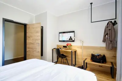 Ein Bett oder Betten in einem Zimmer der Unterkunft Gasthof Neuwirt Unterföhring