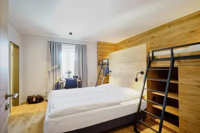 Ein Bett oder Betten in einem Zimmer der Unterkunft Gasthof Neuwirt Unterföhring