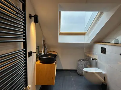 Ein Badezimmer in der Unterkunft Ferienwohnung Kirschgarten mit Infrarot-Kabine