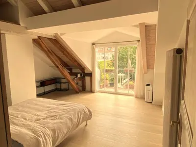 Ein Bett oder Betten in einem Zimmer der Unterkunft Loft München