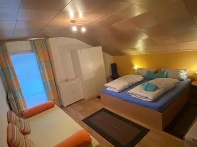 Ein Bett oder Betten in einem Zimmer der Unterkunft Gästehaus Beranek