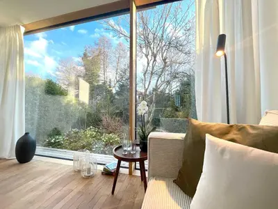 Ein Sitzbereich in der Unterkunft Blueberry Living - Wohlfühl-Apartment Starnberger See, Design, Sport & Natur