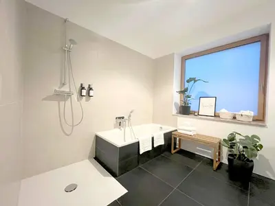 Ein Badezimmer in der Unterkunft Blueberry Living - Wohlfühl-Apartment Starnberger See, Design, Sport & Natur