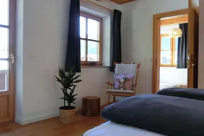 Ein Bett oder Betten in einem Zimmer der Unterkunft Bett & Berge - Ferienwohnung in den Schlierseer Bergen