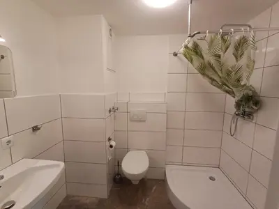 Ein Badezimmer in der Unterkunft LivBiz Apartments - Adelsried