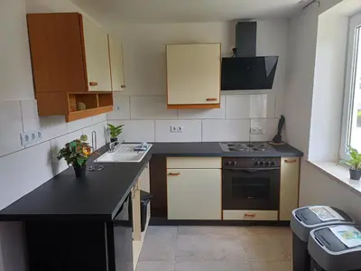 Küche/Küchenzeile in der Unterkunft LivBiz Apartments - Adelsried