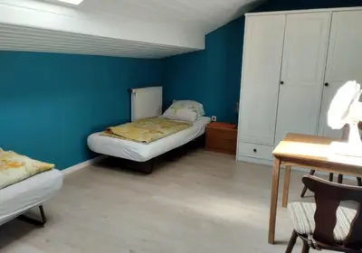 Ein Bett oder Betten in einem Zimmer der Unterkunft LivBiz Apartments - Issing