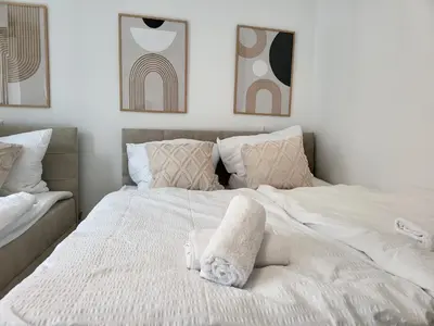 Ein Bett oder Betten in einem Zimmer der Unterkunft SiOUX stilvolle Designapartments im Zentrum