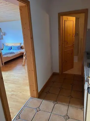 Ein Bett oder Betten in einem Zimmer der Unterkunft Ferienwohnung am Bauernhof