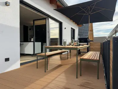 Ein Balkon oder eine Terrasse in der Unterkunft Neues Repräsentatives Designer Loft im Herzen Bayerns