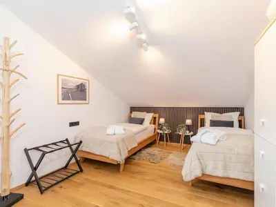 Ein Bett oder Betten in einem Zimmer der Unterkunft Chiemgauloft Comfortable holiday residence