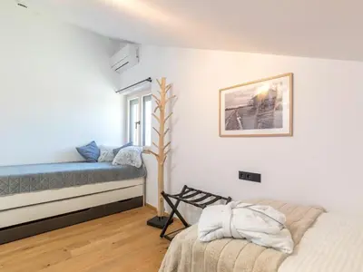 Ein Bett oder Betten in einem Zimmer der Unterkunft Chiemgauloft Comfortable holiday residence