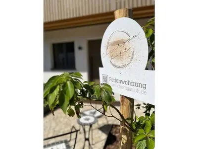 Ein Zertifikat, Auszeichnung, Logo oder anderes Dokument, das in der Unterkunft Chiemgauloft Comfortable holiday residence ausgestellt ist