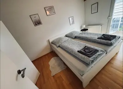 Ein Bett oder Betten in einem Zimmer der Unterkunft Einfamilienhaus im 5Seen-Land