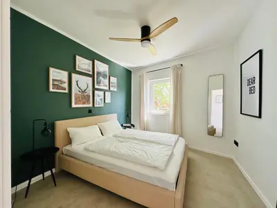 Ein Bett oder Betten in einem Zimmer der Unterkunft Modern und stilvoll eingerichtetes Tiny House