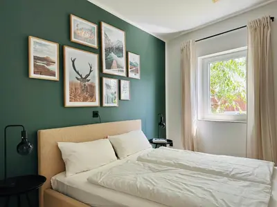 Ein Bett oder Betten in einem Zimmer der Unterkunft Modern und stilvoll eingerichtetes Tiny House