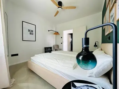 Ein Bett oder Betten in einem Zimmer der Unterkunft Modern und stilvoll eingerichtetes Tiny House