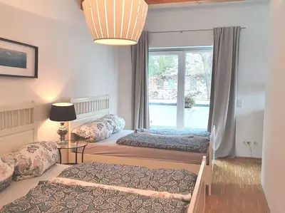 Ein Bett oder Betten in einem Zimmer der Unterkunft Wohnen am Waldrand