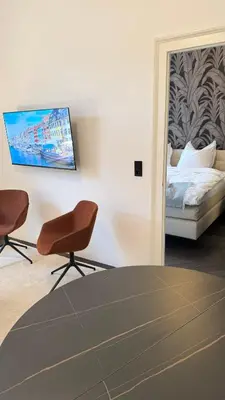 Ein Bett oder Betten in einem Zimmer der Unterkunft Exklusive Wohnung im Herzen Münchens