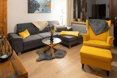 Ein Sitzbereich in der Unterkunft Ferienwohnung Alpenglück