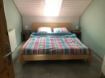 Ein Bett oder Betten in einem Zimmer der Unterkunft Stilvolles Apartment bei Augsburg