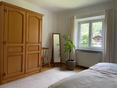 Ein Bett oder Betten in einem Zimmer der Unterkunft Haus KaiserInn - komfortable Wohnung 82 qm TOP ausgestattet, 2 Schlafzimmer mit Balkon und Bergblick