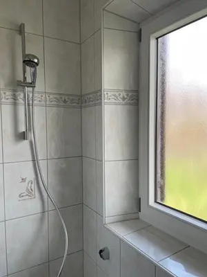 Ein Badezimmer in der Unterkunft Haus KaiserInn - komfortable Wohnung 82 qm TOP ausgestattet, 2 Schlafzimmer mit Balkon und Bergblick