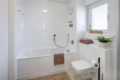 Ein Badezimmer in der Unterkunft Zugspitze Apartment