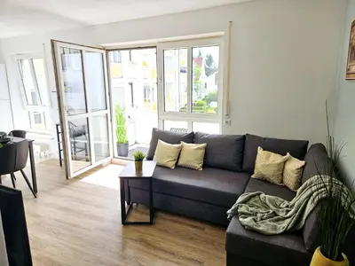 Ein Sitzbereich in der Unterkunft Like at home - moderne Wohnung in Königsbrunn - 30qm - Netflix