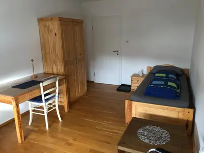 Ein Bett oder Betten in einem Zimmer der Unterkunft Appartementhaus AdiS