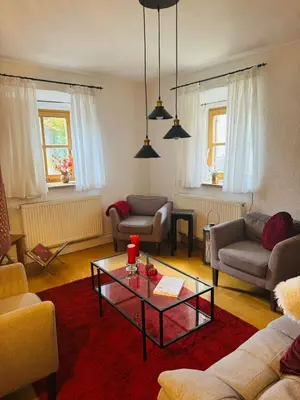 Ein Sitzbereich in der Unterkunft Kleines Landhaus