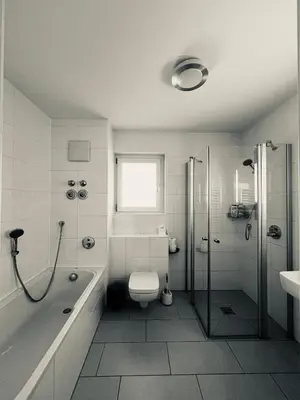 Ein Badezimmer in der Unterkunft Zugspitze City Center Apartment