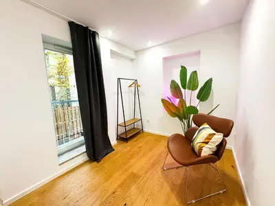 Ein Sitzbereich in der Unterkunft ma suite - urban apartment city center - private parking 2-4P