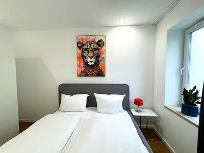 Ein Bett oder Betten in einem Zimmer der Unterkunft ma suite - urban apartment city center - private parking 2-4P