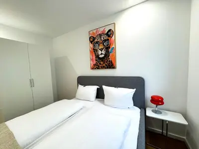 Ein Bett oder Betten in einem Zimmer der Unterkunft ma suite - urban apartment city center - private parking 2-4P