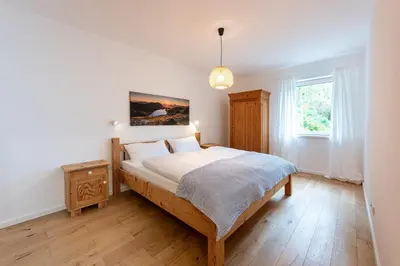 Ein Bett oder Betten in einem Zimmer der Unterkunft Aktiv im Achental