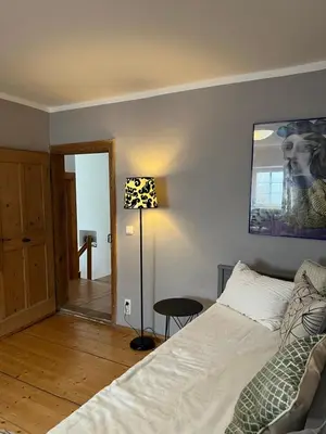 Ein Bett oder Betten in einem Zimmer der Unterkunft Historic and unique Farm House from 1604
