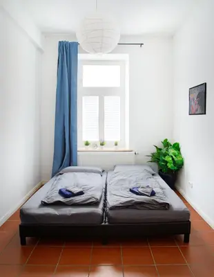 Ein Bett oder Betten in einem Zimmer der Unterkunft Stilvolle, moderne Wohnung, im Herzen von München, nahe Isar