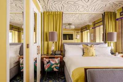 Ein Bett oder Betten in einem Zimmer der Unterkunft House of Hütter- Münchner Kindl, Small Luxury Hotels of the World