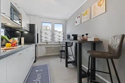Küche/Küchenzeile in der Unterkunft Primero Relax-Home I Premium Apartments ab 90qm I Balkon Garage I A8-Fuggerei