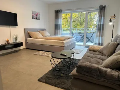 Ein Sitzbereich in der Unterkunft modernes Apartment in guter Lage